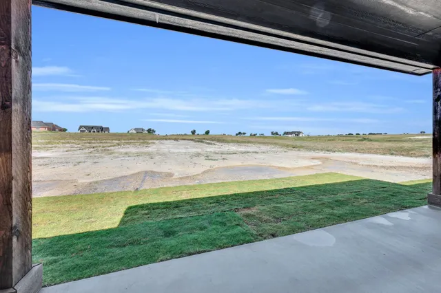 a view of an ocean with a big yard