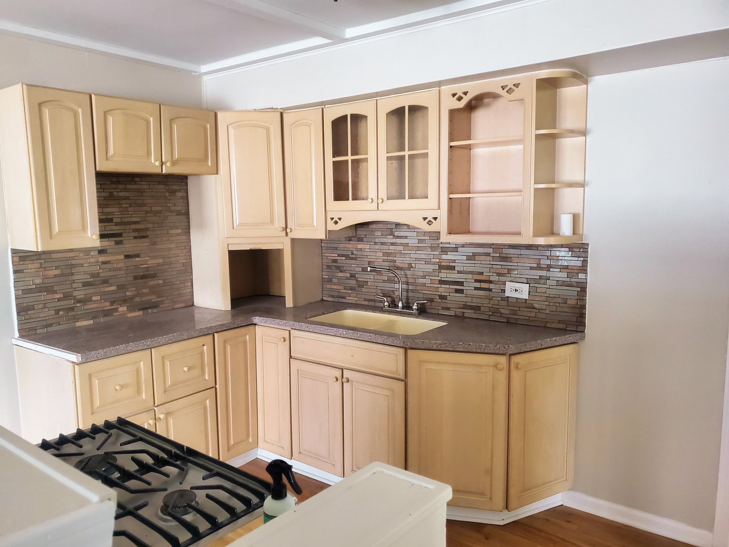 185 Eagle Point Road Fox Lake, IL 60020 - Photo 18 of 42 a kitchen with stainless steel appliances granite countertop a stove and a refrigerator