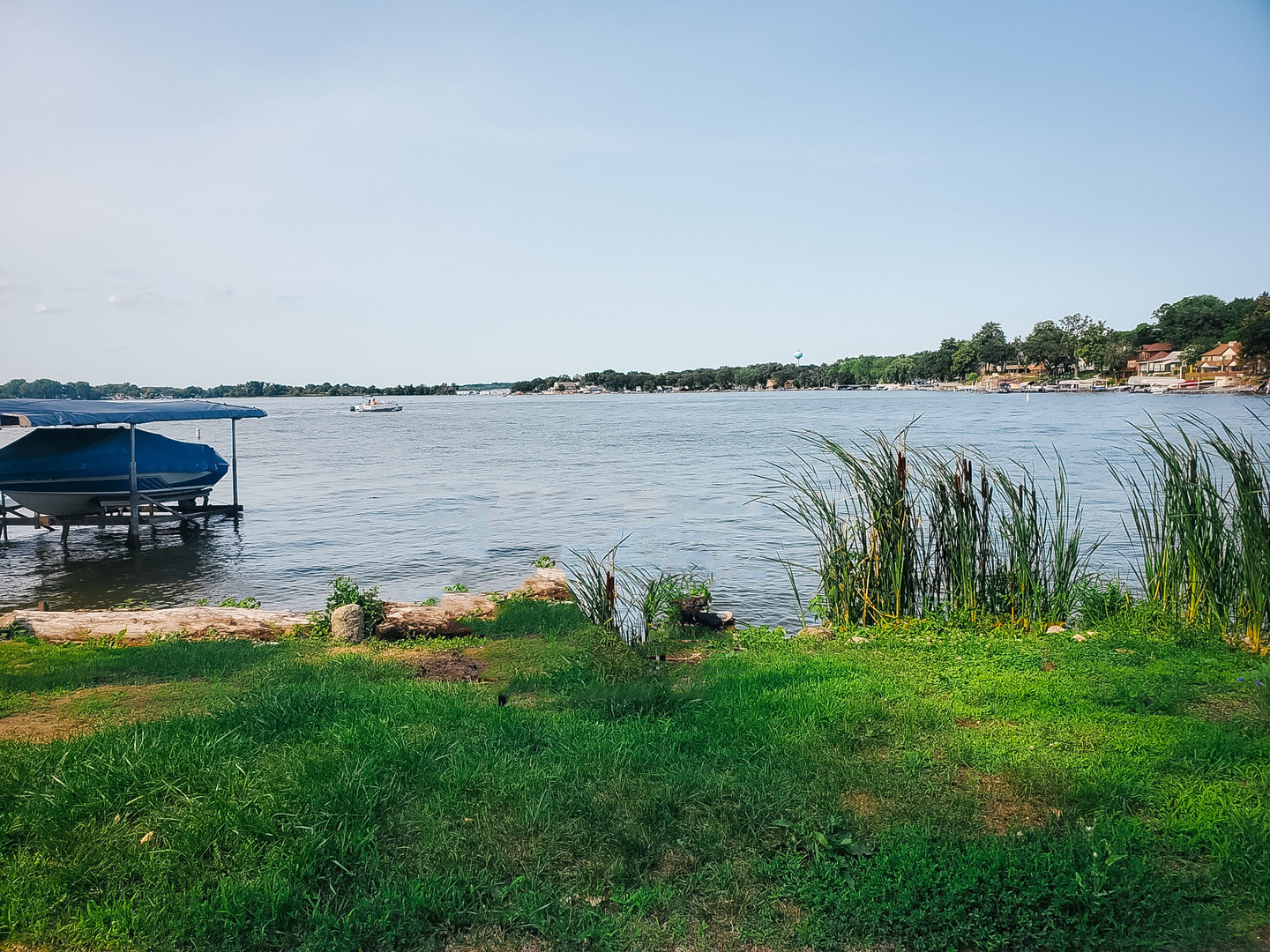 185 Eagle Point Road Fox Lake, IL 60020 - Photo 31 of 42 a yard with lake view and houses with outdoor seating