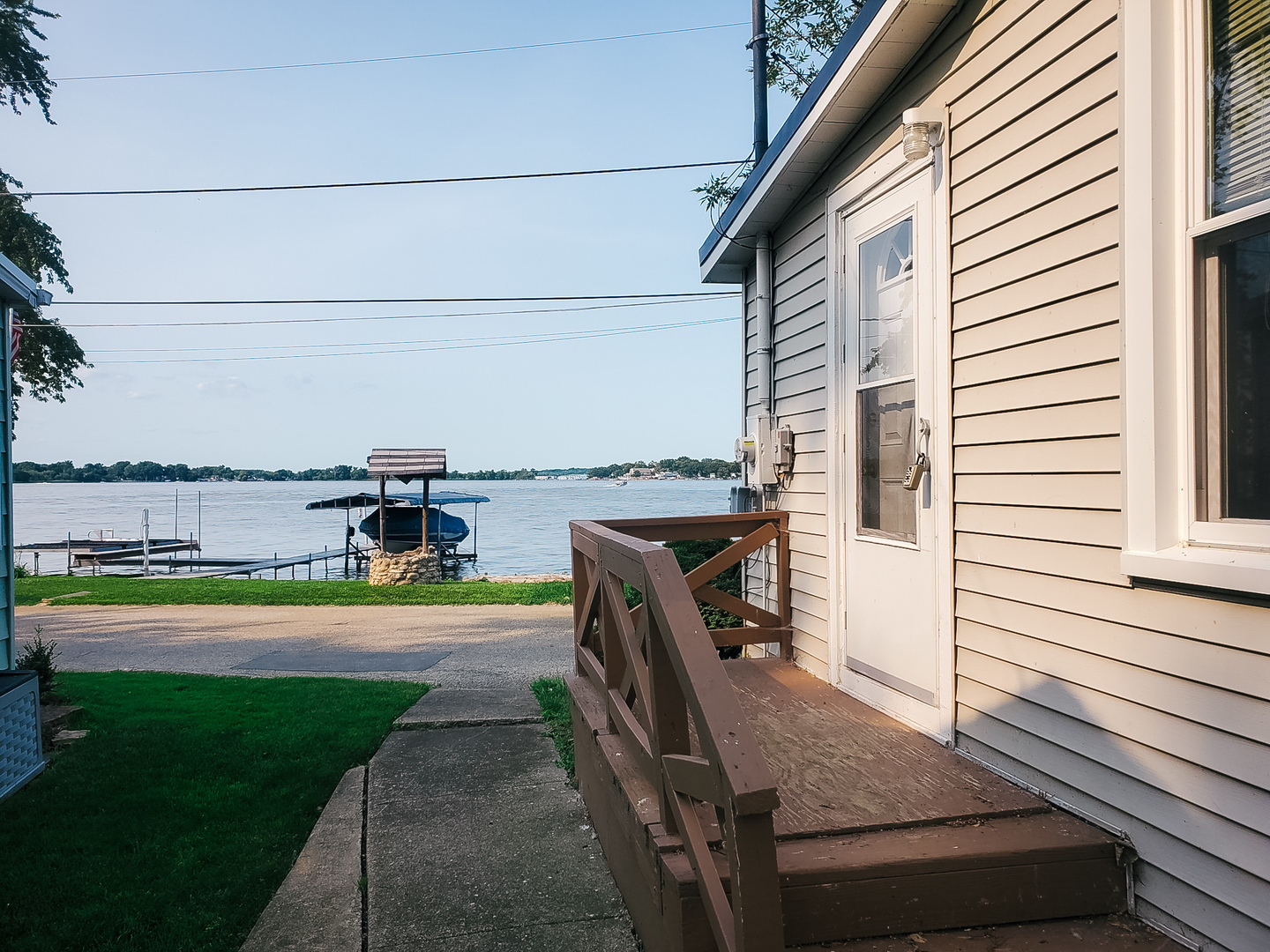185 Eagle Point Road Fox Lake, IL 60020 - Photo 7 of 42 a view of a terrace with a table and chairs