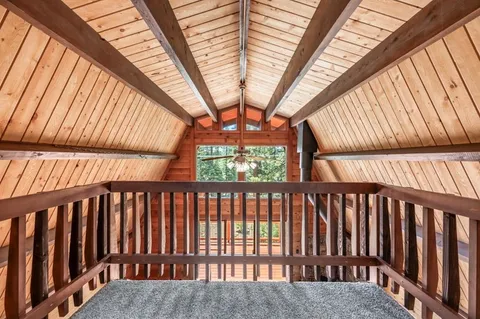 a view of staircase with window