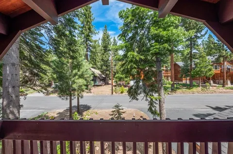 a view of a bench in a backyard
