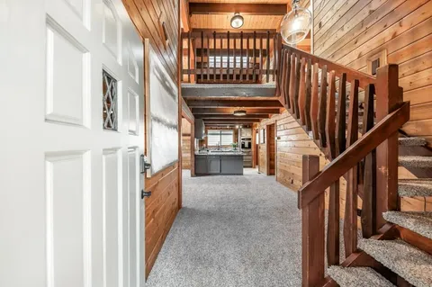 a view of entryway with a front door