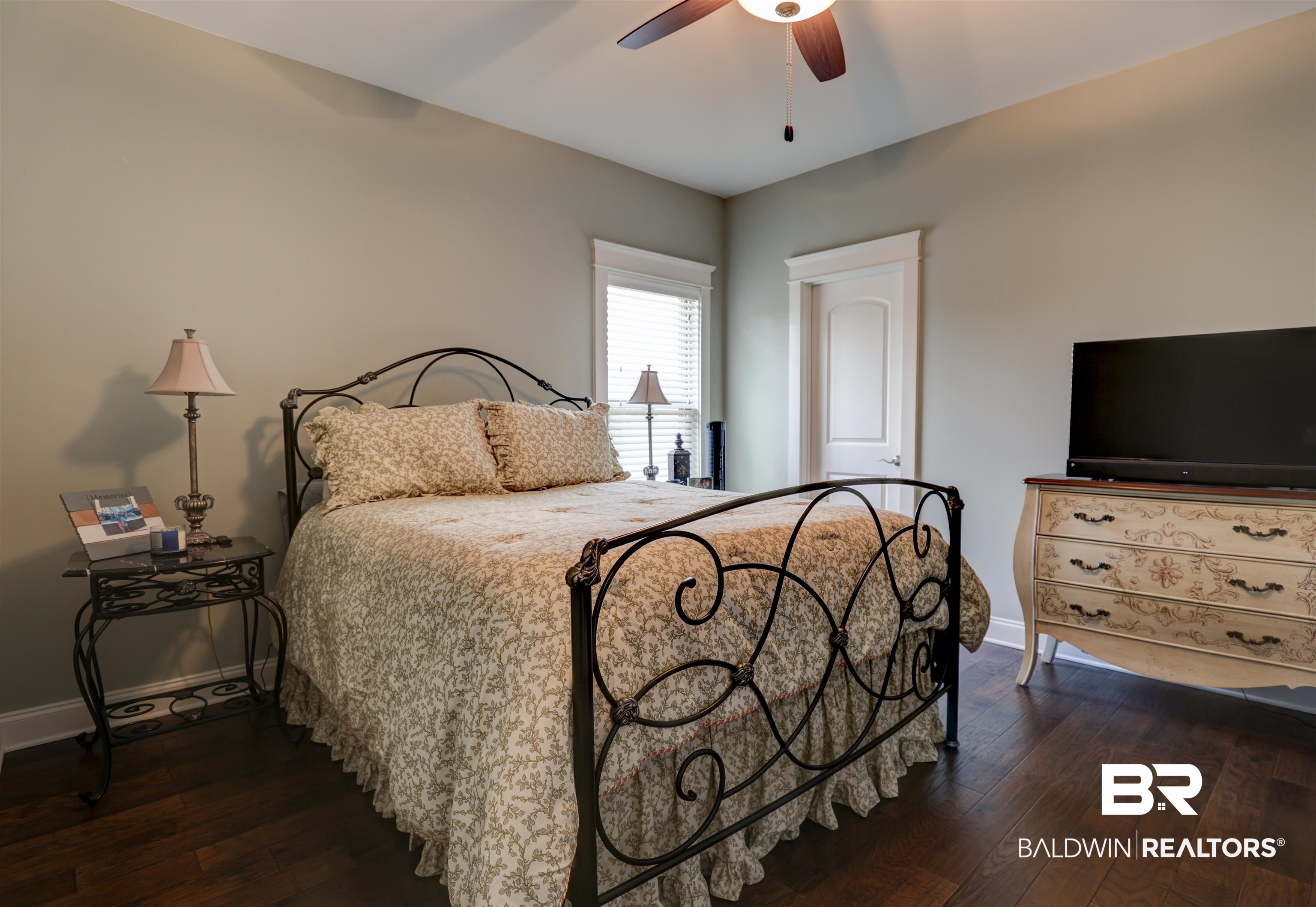 10588 Leesburg Pike Daphne, AL 36526 - Photo 23 of 29 Bedroom with dark wood-type flooring and ceiling fan