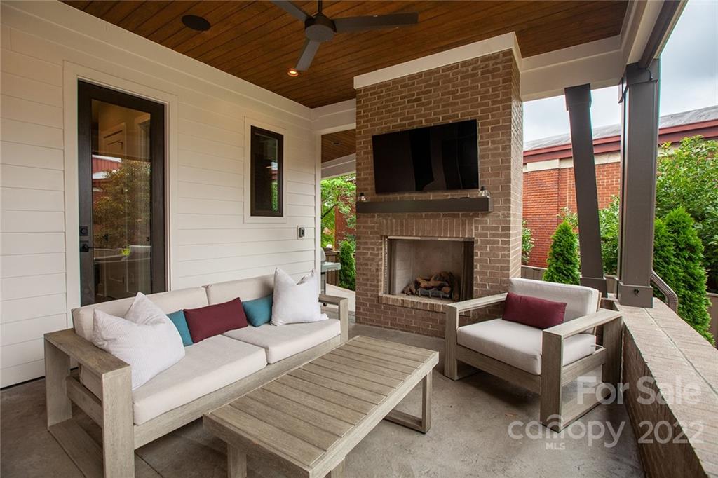 1505 Parson Street Charlotte, NC 28205 - Photo 20 of 48 a living room with furniture fireplace and a flat screen tv