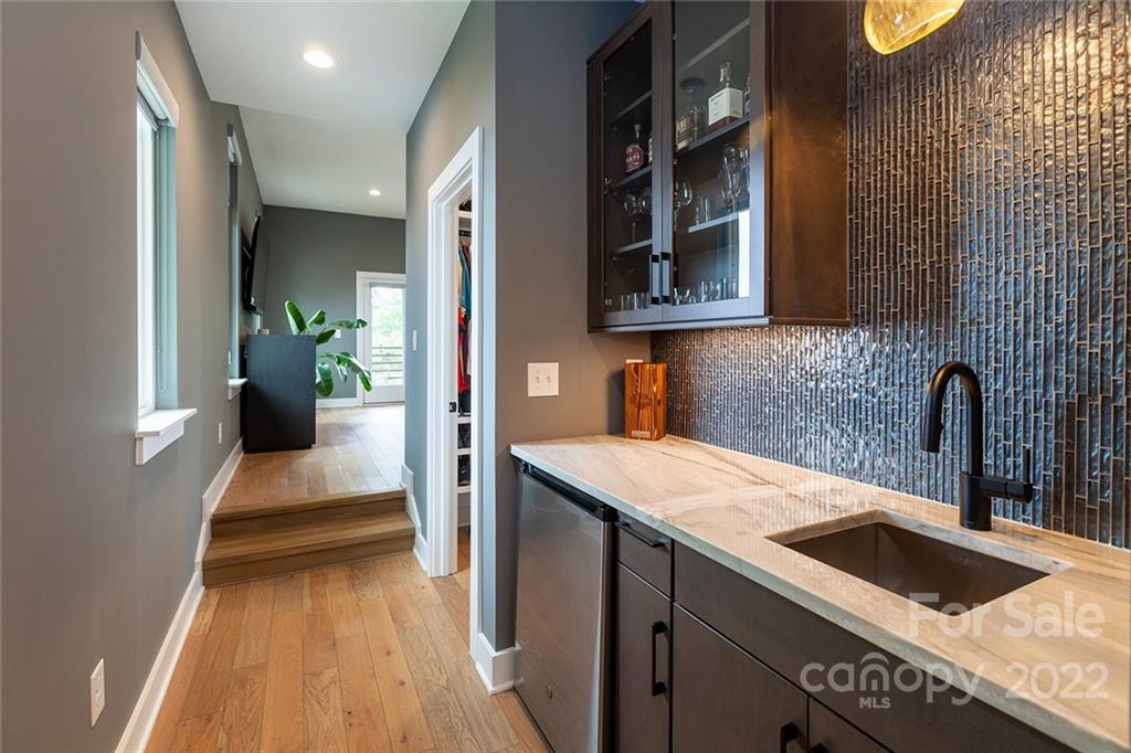 1505 Parson Street Charlotte, NC 28205 - Photo 23 of 48 a kitchen with a sink and a stove top oven