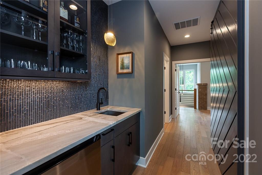 1505 Parson Street Charlotte, NC 28205 - Photo 24 of 48 a bathroom with a sink and a mirror