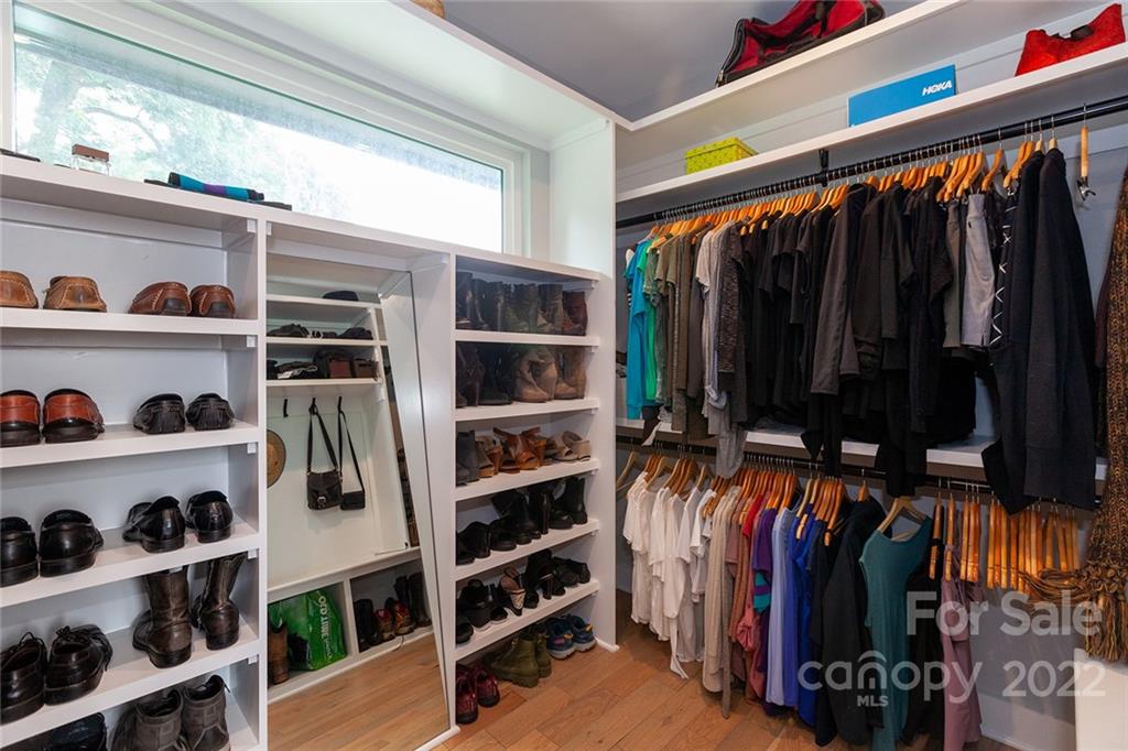 1505 Parson Street Charlotte, NC 28205 - Photo 27 of 48 a view of walk in closet with clothes and shoes