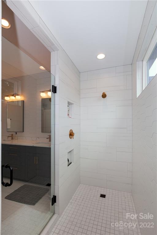 1505 Parson Street Charlotte, NC 28205 - Photo 30 of 48 a bathroom with a sink and a shower