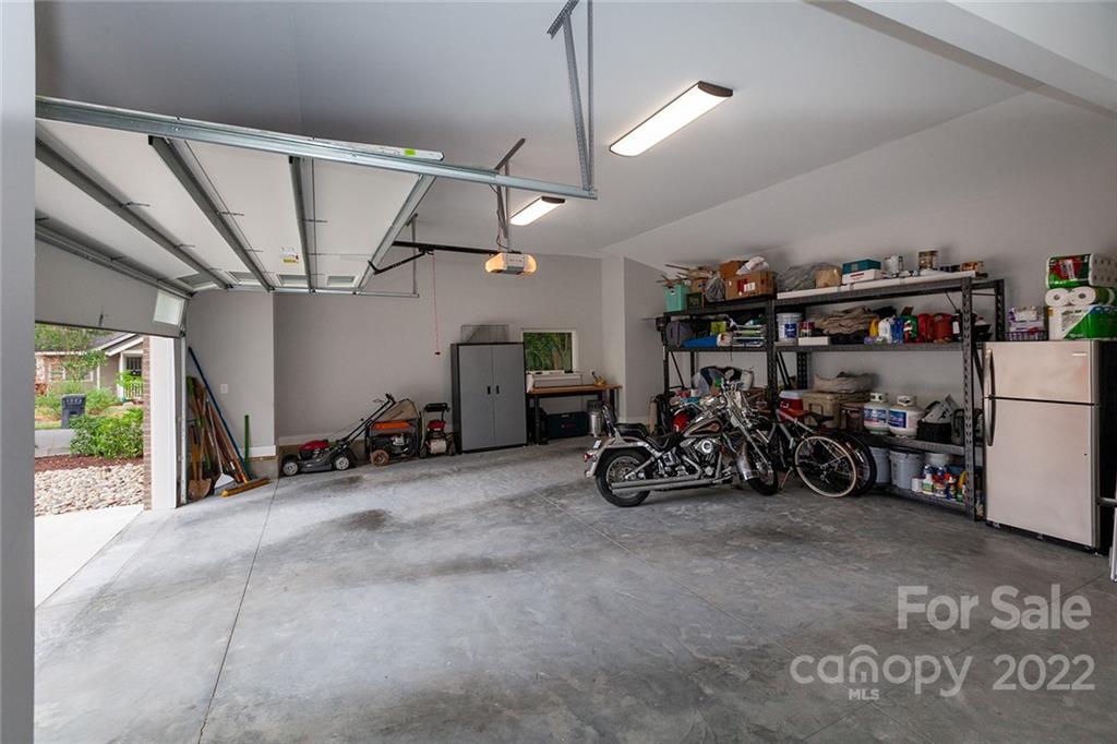 1505 Parson Street Charlotte, NC 28205 - Photo 36 of 48 a view of a garage with a bike and white walls