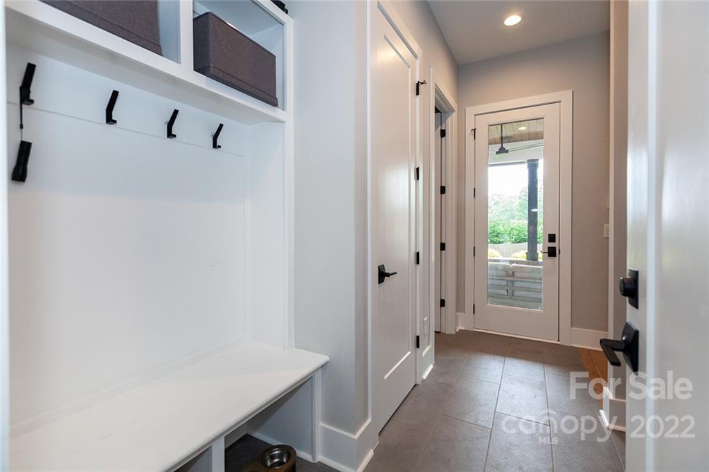 1505 Parson Street Charlotte, NC 28205 - Photo 38 of 48 a view of a hallway with entryway and wooden floor