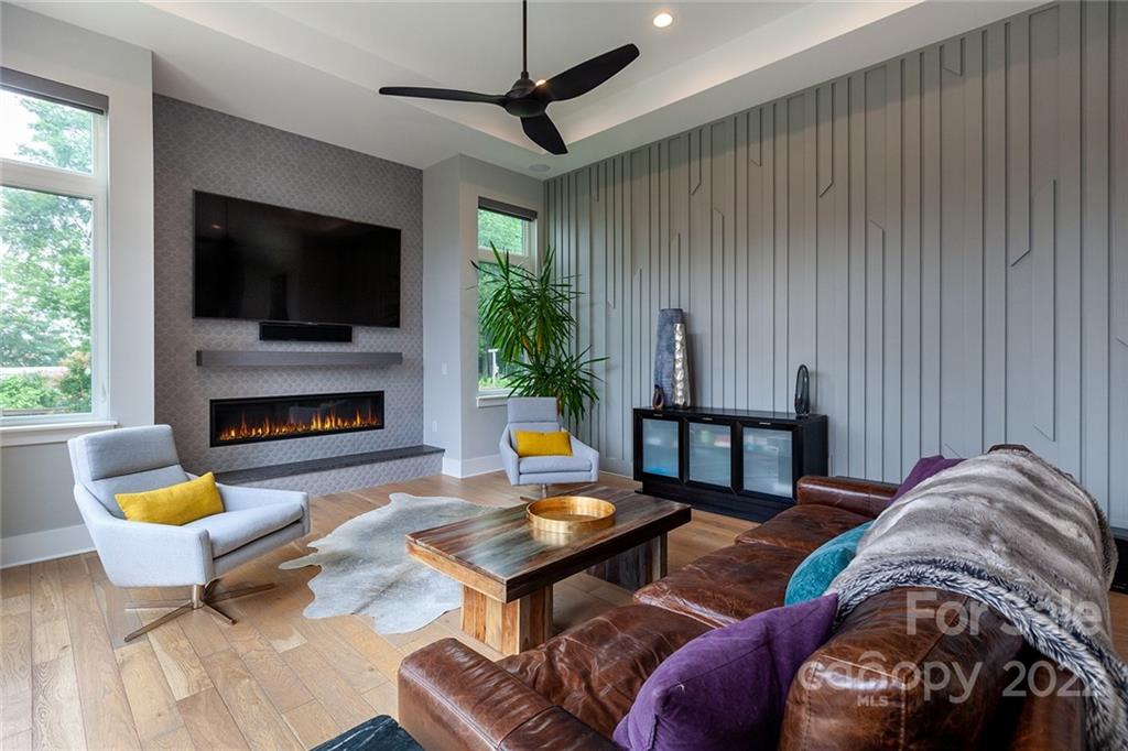 1505 Parson Street Charlotte, NC 28205 - Photo 10 of 48 a living room with furniture and a fireplace