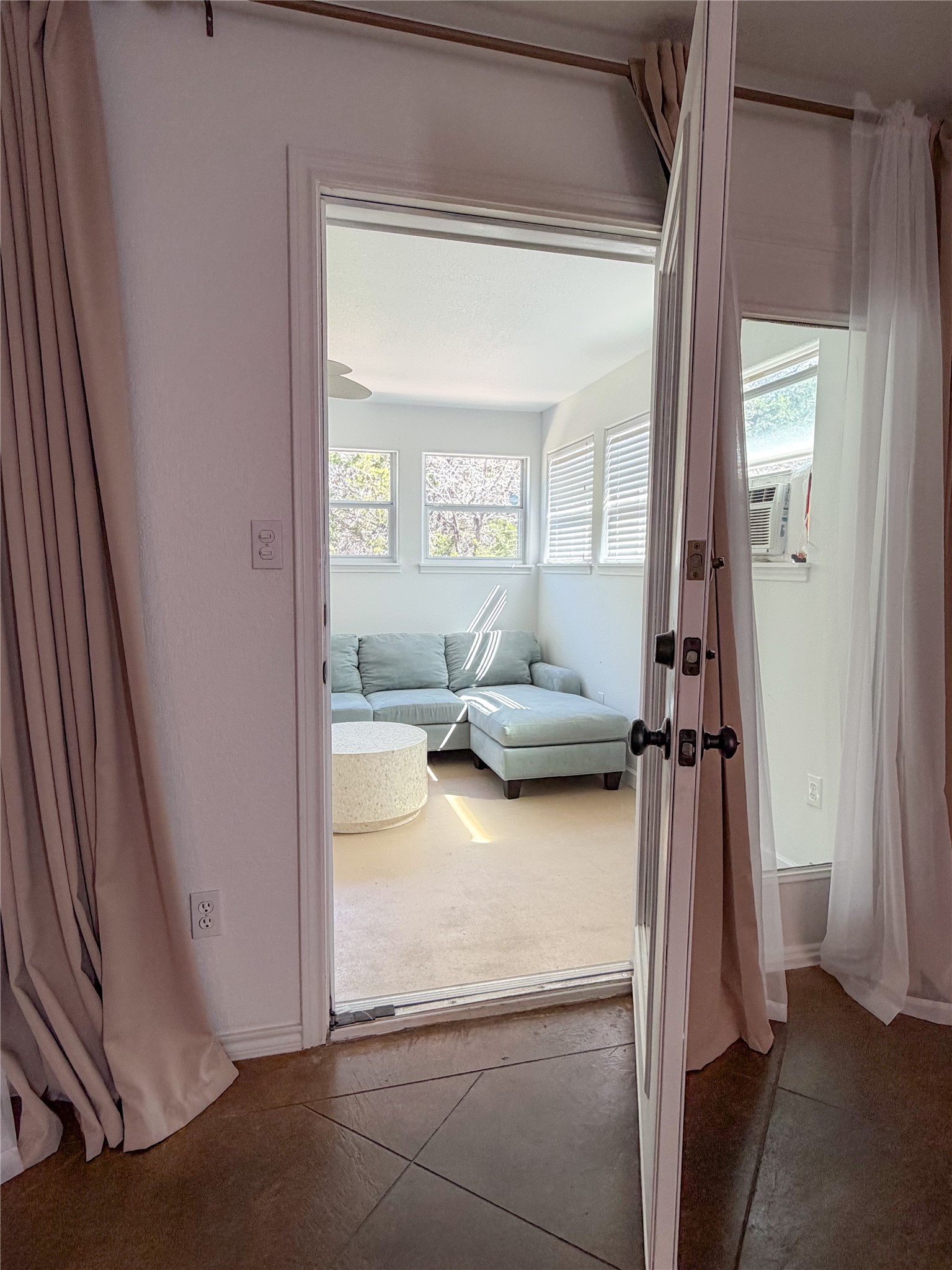 430 Summit Ridge Drive North Point Venture, TX 78645 - Photo 18 of 39 Doorway featuring baseboards and tile patterned floors