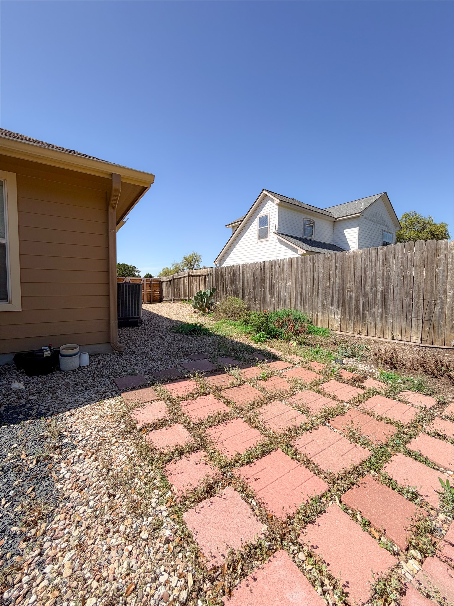 430 Summit Ridge Drive North Point Venture, TX 78645 - Photo 28 of 39 View of fenced backyard