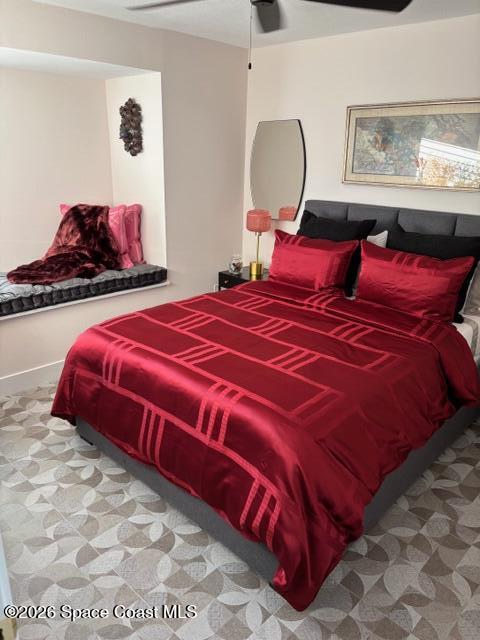 730 Cobblestone Lane Northeast Palm Bay, FL 32905 - Photo 5 of 9 a bedroom with a bed and window