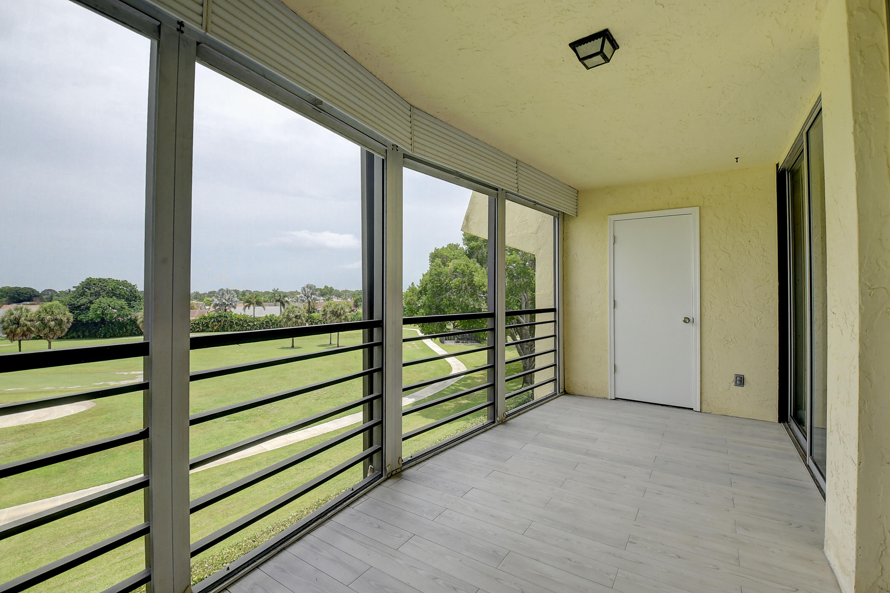 23305 Barwood Lane North, Unit 406 Boca Raton, FL 33428 - Photo 27 of 41 a view of a room with window