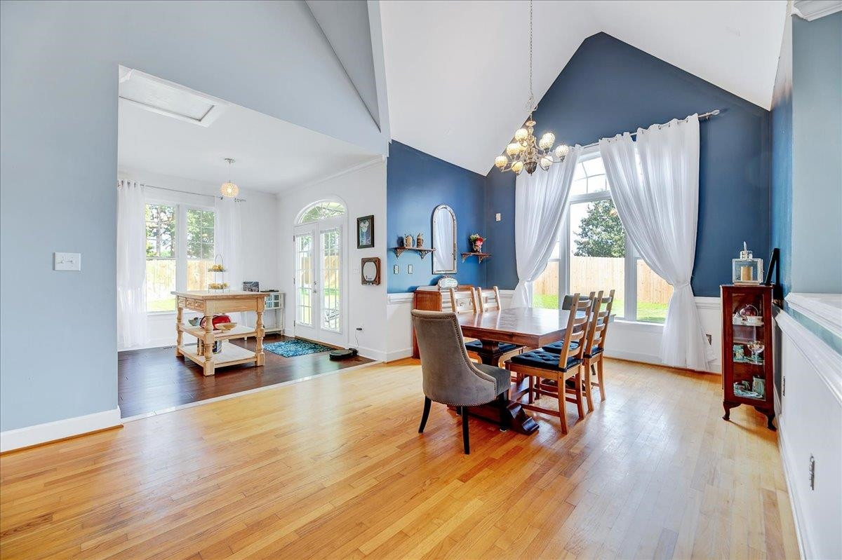 2222 Zacks Mill Road Angier, NC 27501 - Photo 19 of 48 a view of a dining room with furniture and wooden floor