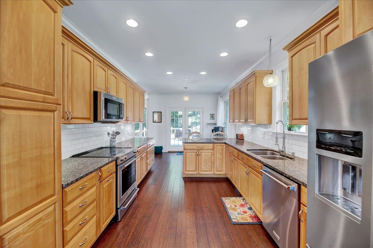 2222 Zacks Mill Road Angier, NC 27501 - Photo 23 of 48 a large kitchen with stainless steel appliances granite countertop counter space a sink and cabinets