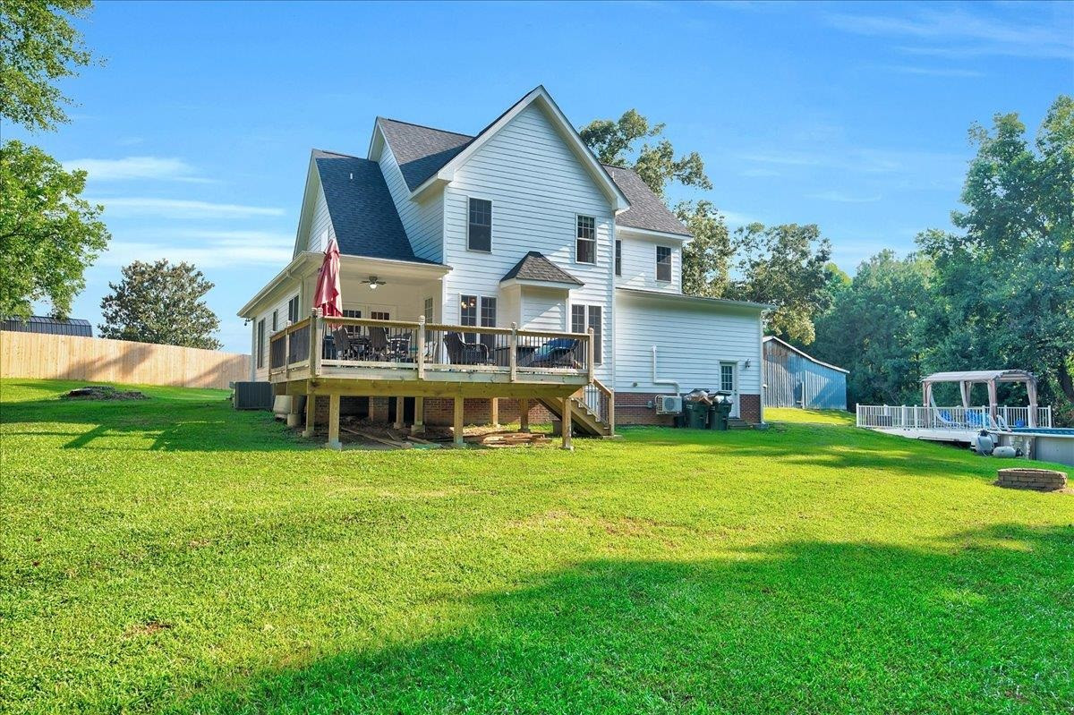 2222 Zacks Mill Road Angier, NC 27501 - Photo 8 of 48 a front view of house with yard outdoor seating and green space