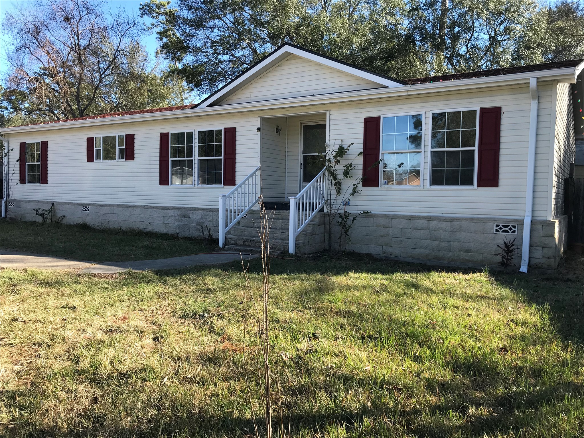 front view of a house with a yard