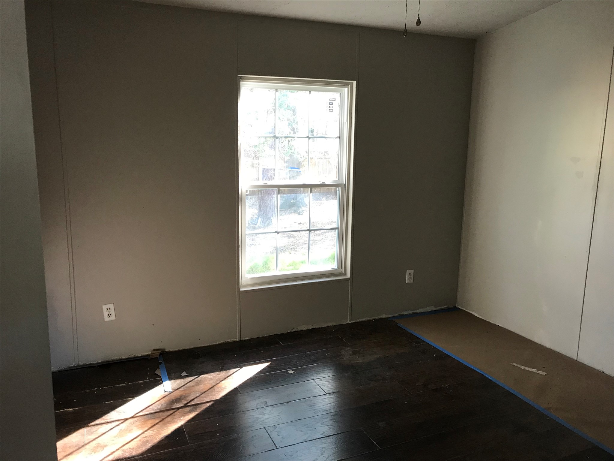 31606 Bryan Street Magnolia, TX 77355 - Photo 12 of 19 an empty room with wooden floor and windows