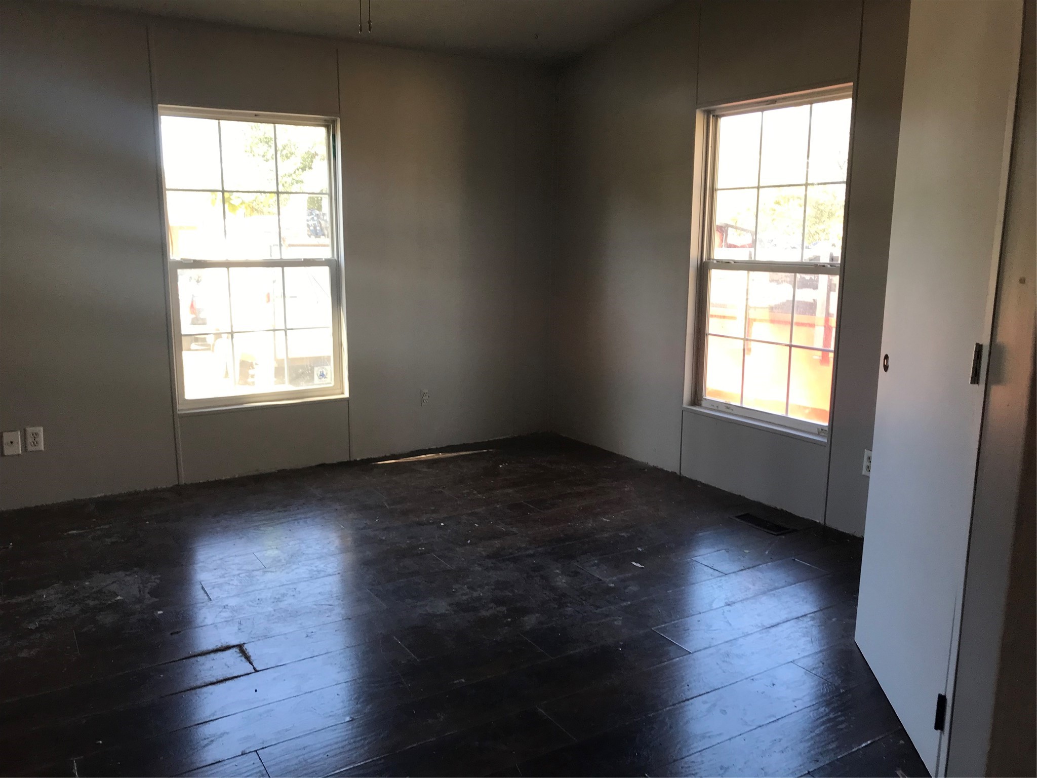 31606 Bryan Street Magnolia, TX 77355 - Photo 13 of 19 an empty room with wooden floor and windows