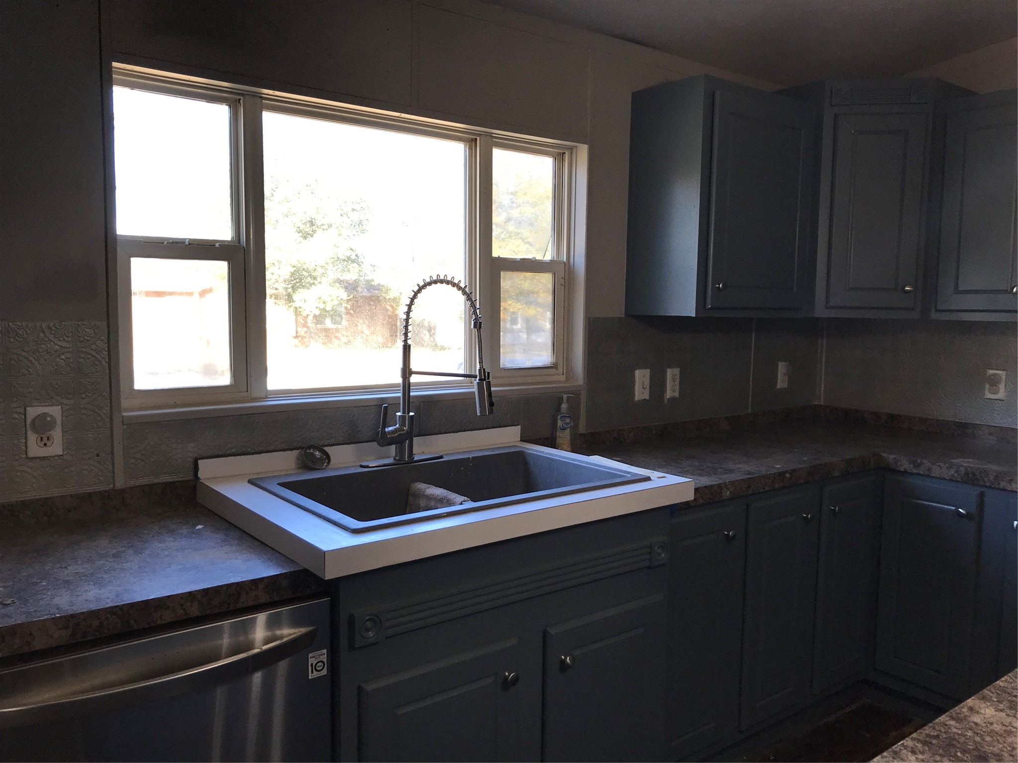 31606 Bryan Street Magnolia, TX 77355 - Photo 4 of 19 a kitchen with a sink cabinets and window