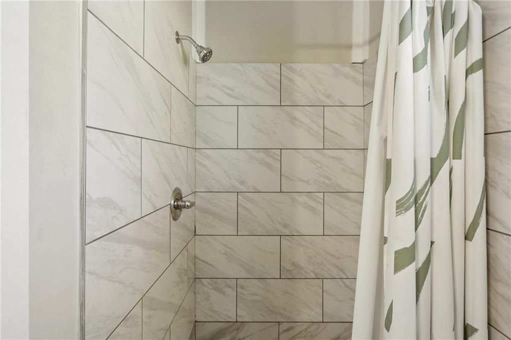 1291 Richard Road Decatur, GA 30032 - Photo 10 of 16 a bathroom with a shower