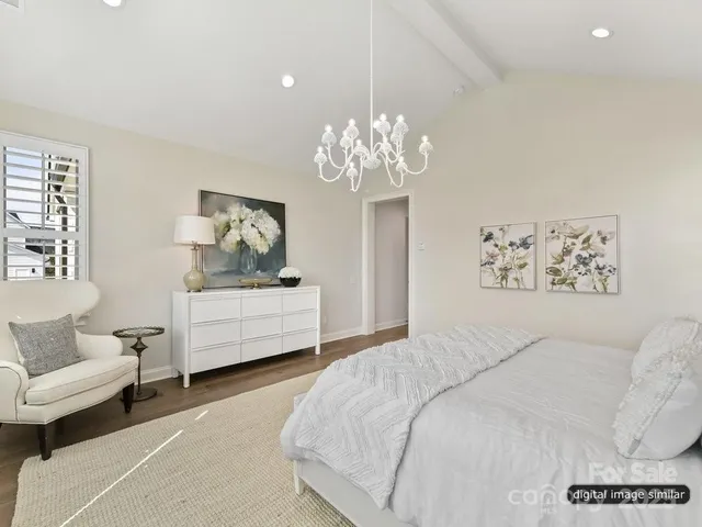 a bathroom with a tub a sink and a shower
