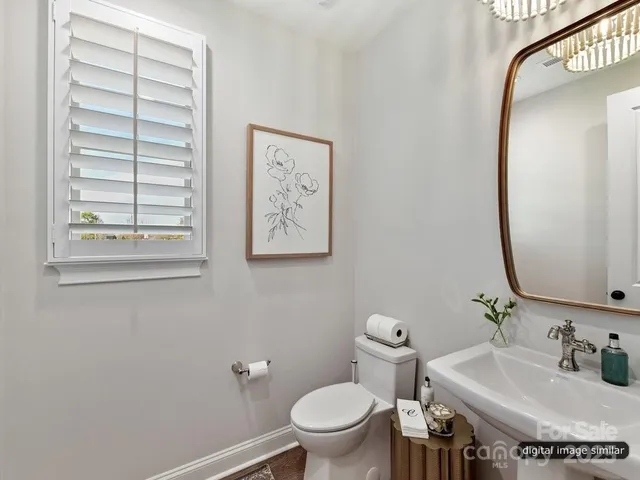 a view of entryway with wooden floor and stairs