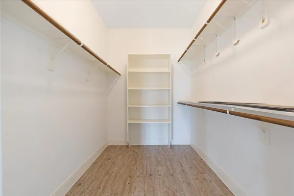a view of an empty walk in closet