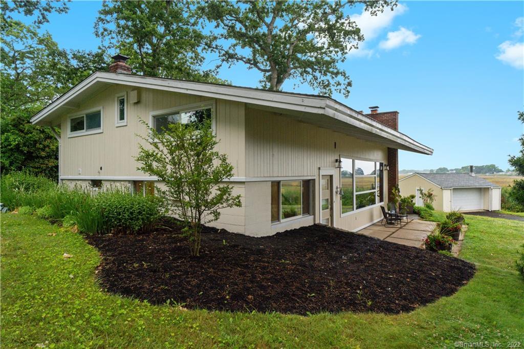 14 Shore Grove Road Clinton, CT 06413 - Photo 1 of 1 Mid-century Modern with 2-car garage on .9 acre