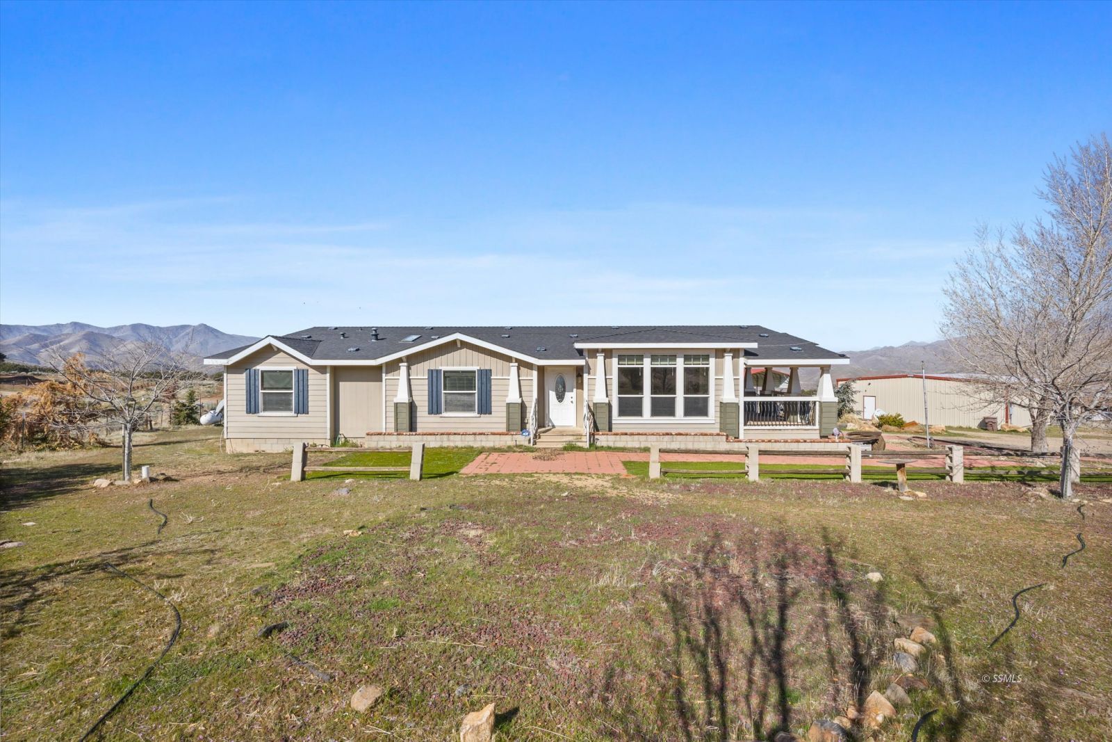 4131 Brooks Road Weldon, CA 93283 - Photo 2 of 49 a front view of a house with a yard