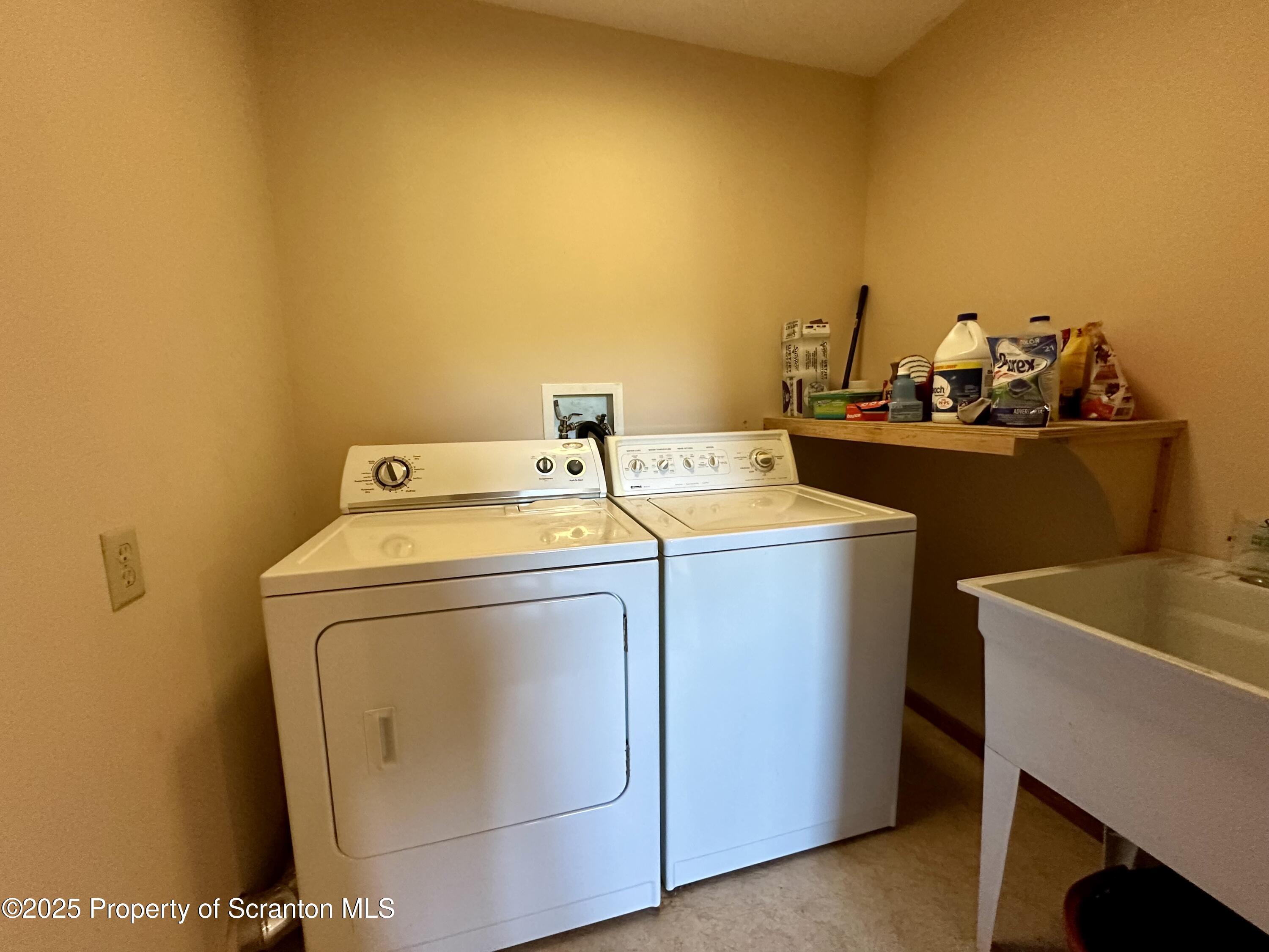 5290 Irish Hill Road Montrose, PA 18801 - Photo 29 of 67 a utility room with dryer and washer