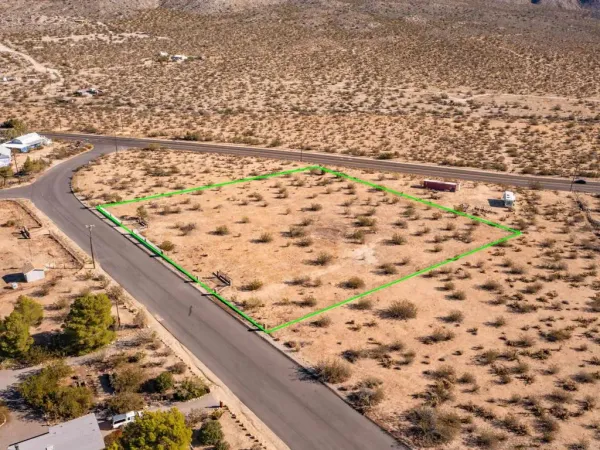 a view of an mountain with a mountain in the background