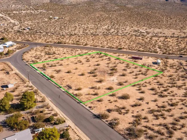 a view of an mountain with a mountain in the background