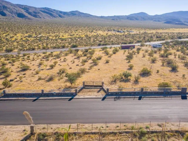 a view of ocean with mountain