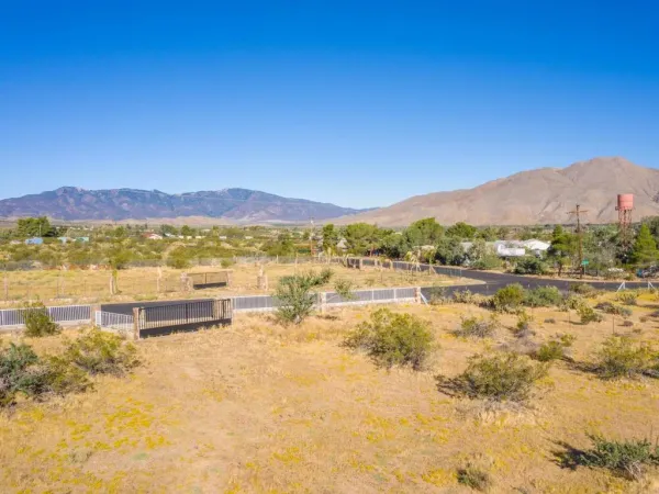 a view of an ocean with a mountain