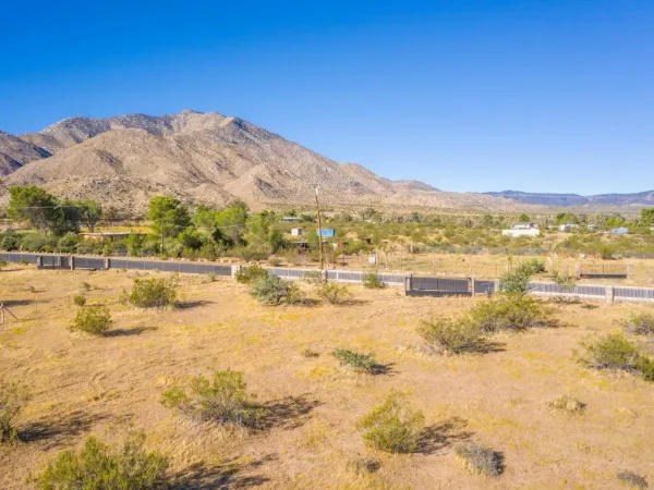 a view of an ocean and a mountain