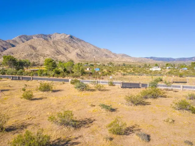 a view of an ocean and a mountain