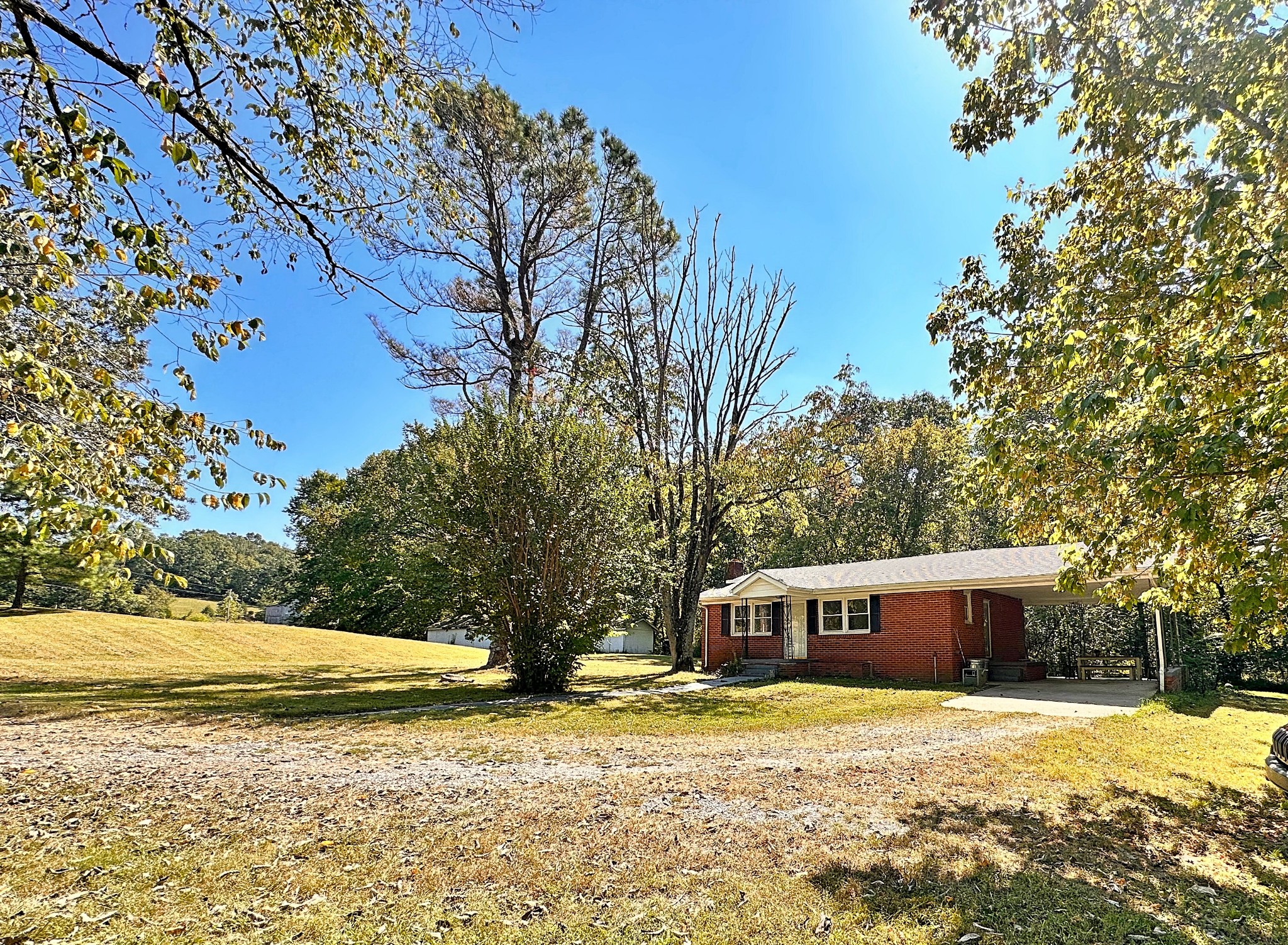 5900 Bryant Hollow Road Cunningham, TN 37052 - Photo 3 of 35 a front view of a house with a yard