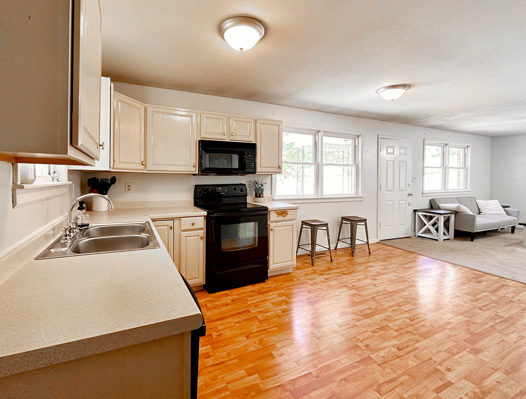 5900 Bryant Hollow Road Cunningham, TN 37052 - Photo 10 of 35 a kitchen with a sink appliances and cabinets