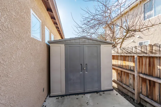 a view of a street with a house