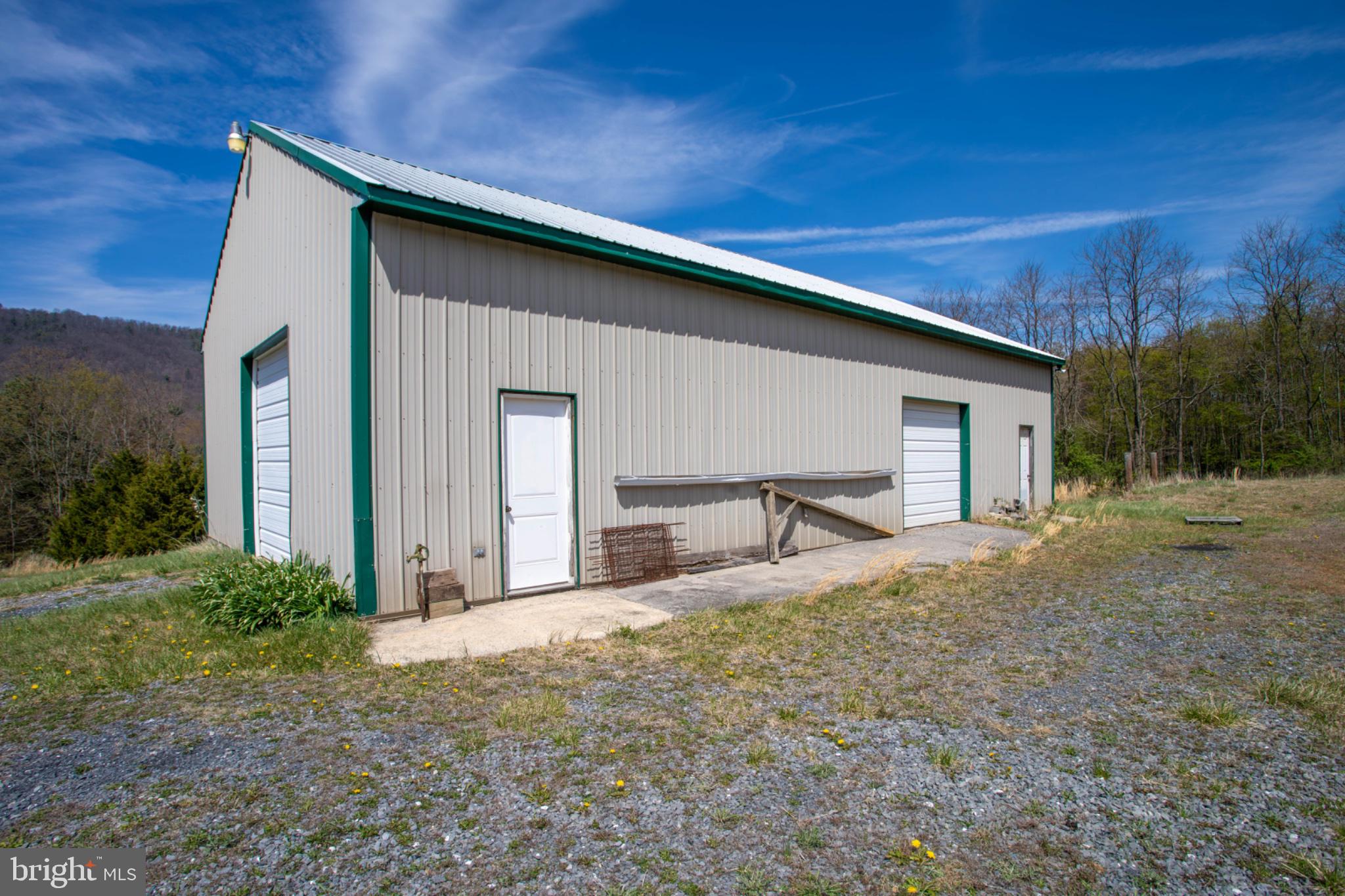 161 Coyote Run Mathias, WV 26812 - Photo 84 of 88 Spacious metal pole building in serene setting.
