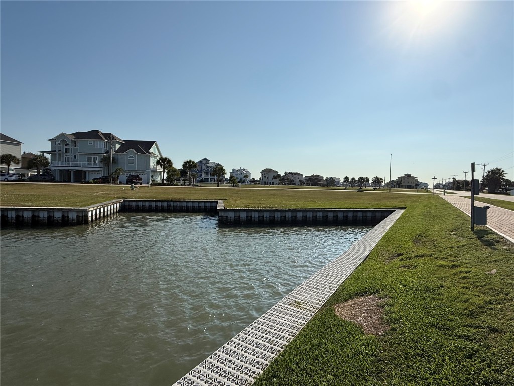 2 Fleming Hitchcock, TX 77563 - Photo 2 of 9 a view of a lake with houses in outdoor space