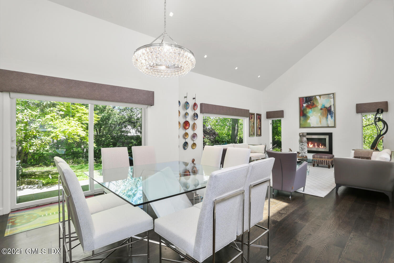 1 Old Church Road, Unit 7 Greenwich, CT 06830 - Photo 11 of 42 a view of a dining room with furniture wooden floor and chandelier