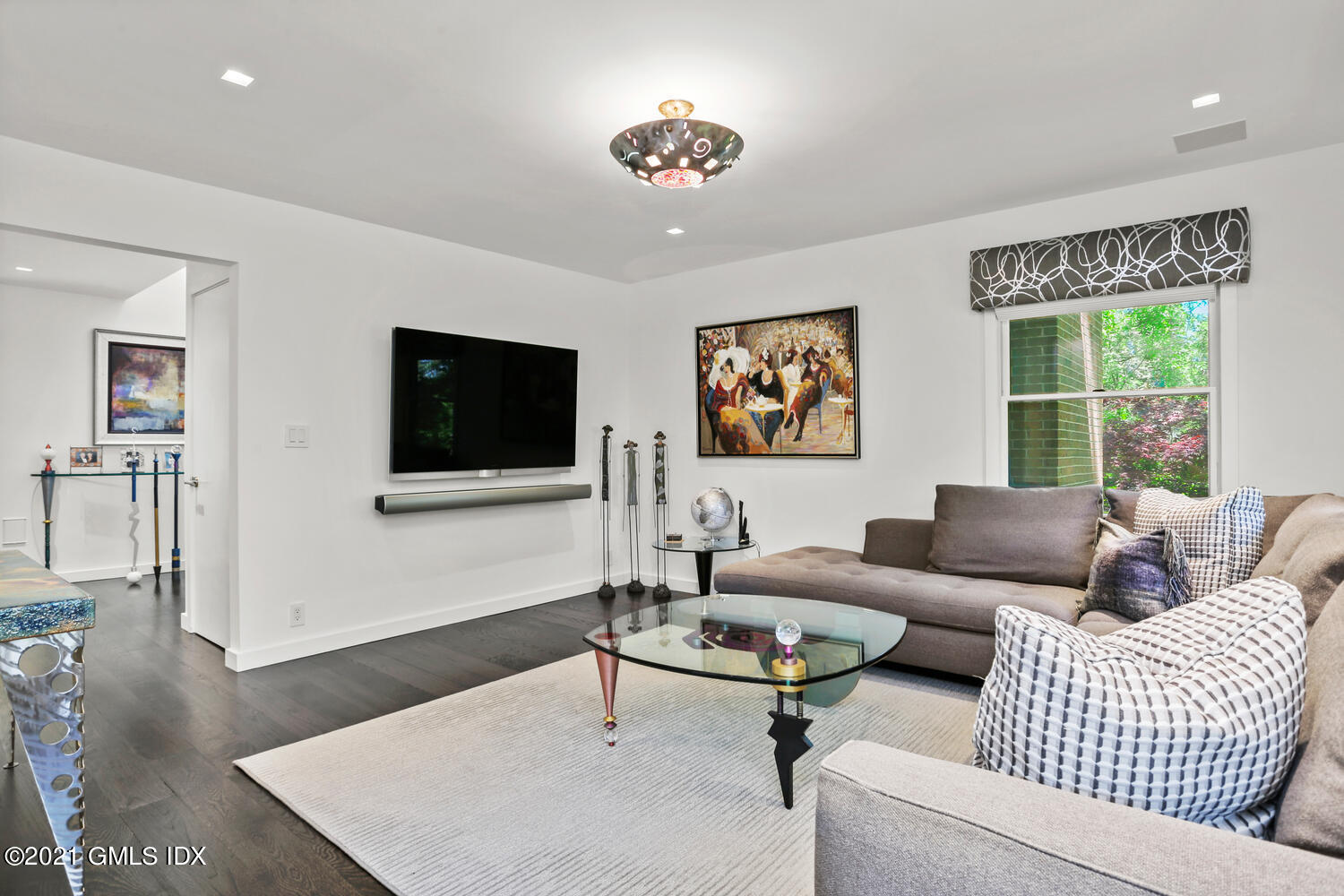 1 Old Church Road, Unit 7 Greenwich, CT 06830 - Photo 15 of 42 a living room with furniture and a flat screen tv