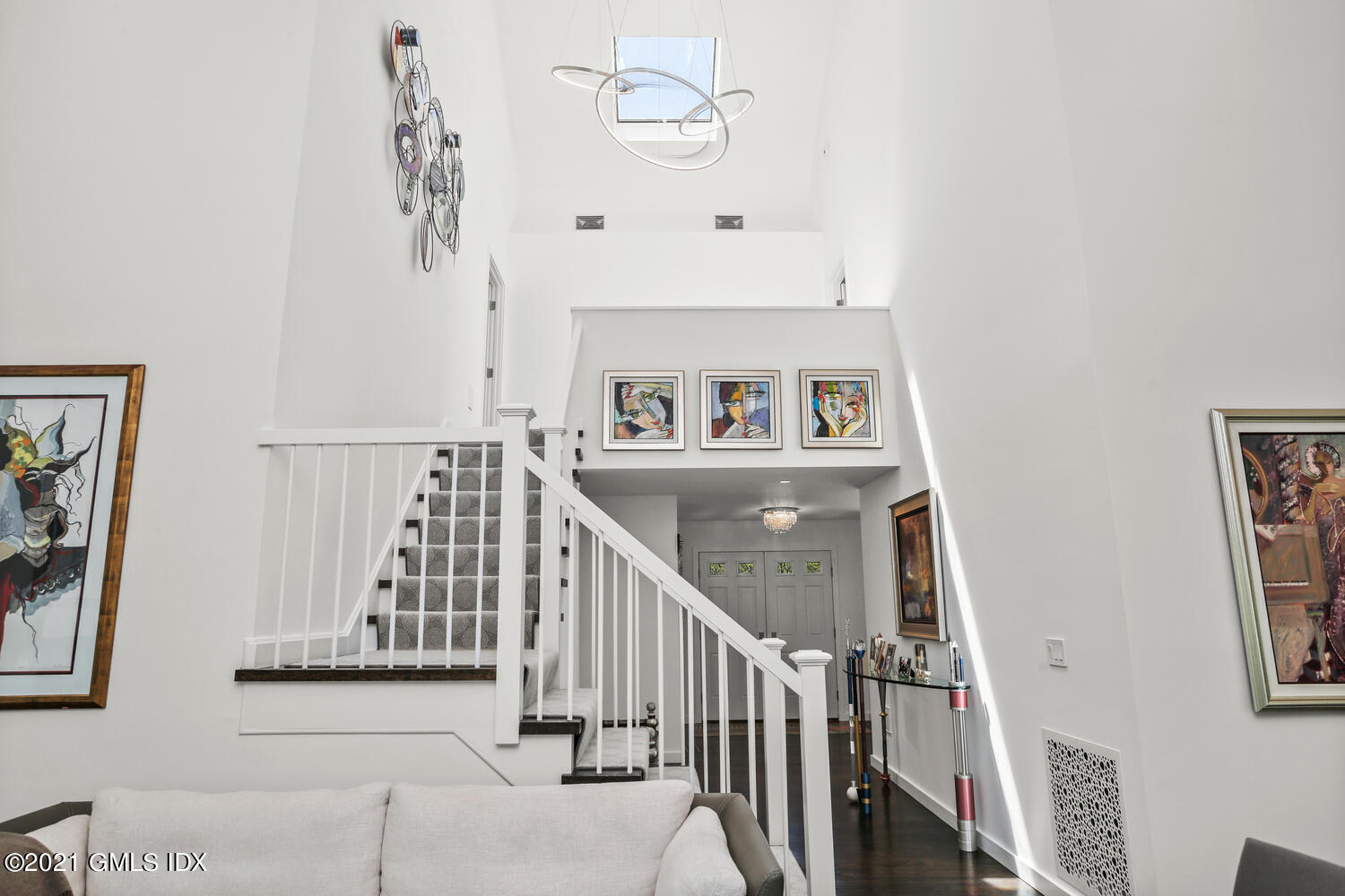 1 Old Church Road, Unit 7 Greenwich, CT 06830 - Photo 20 of 42 a view of a hallway with windows