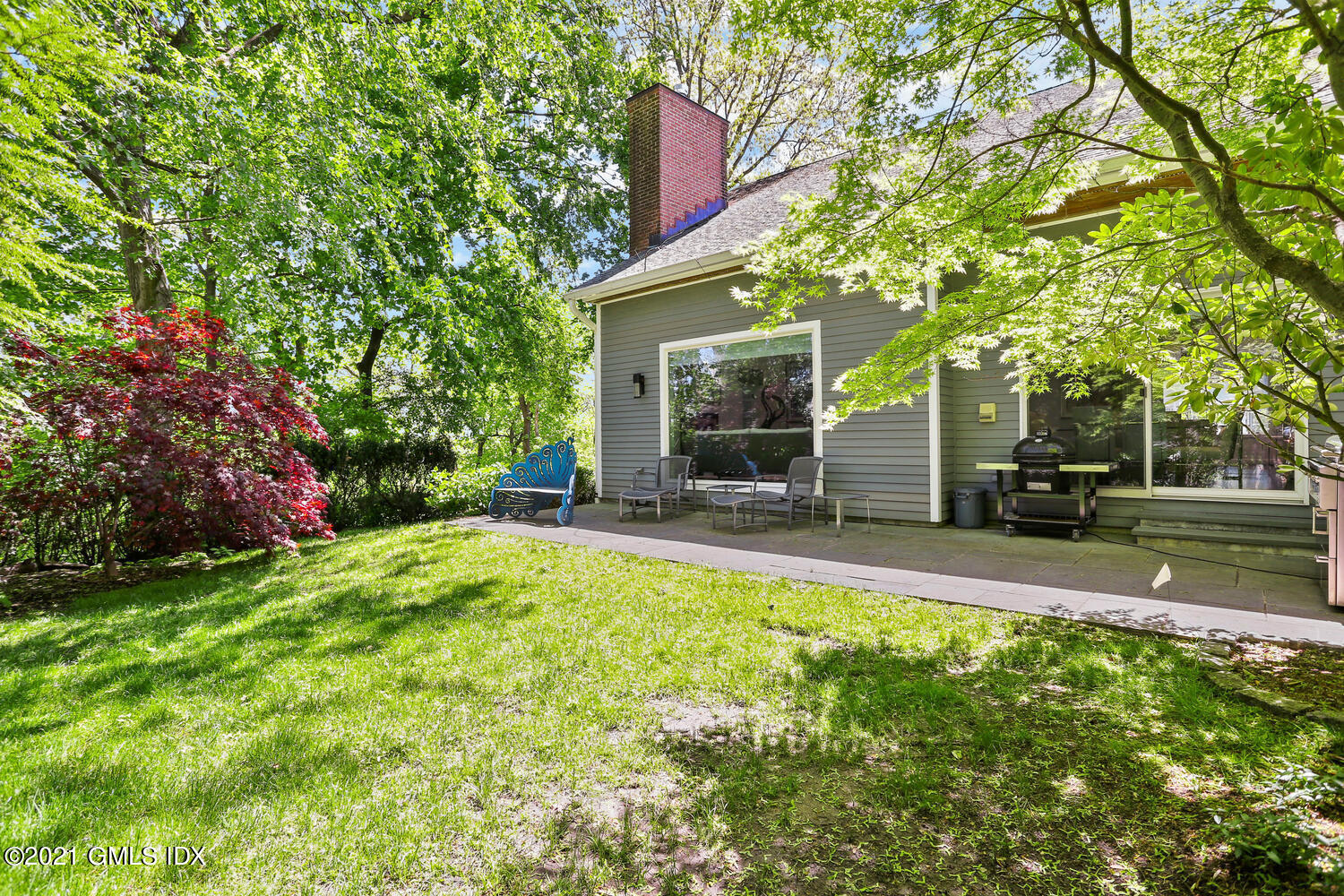 1 Old Church Road, Unit 7 Greenwich, CT 06830 - Photo 35 of 42 a view of a house with backyard and sitting area