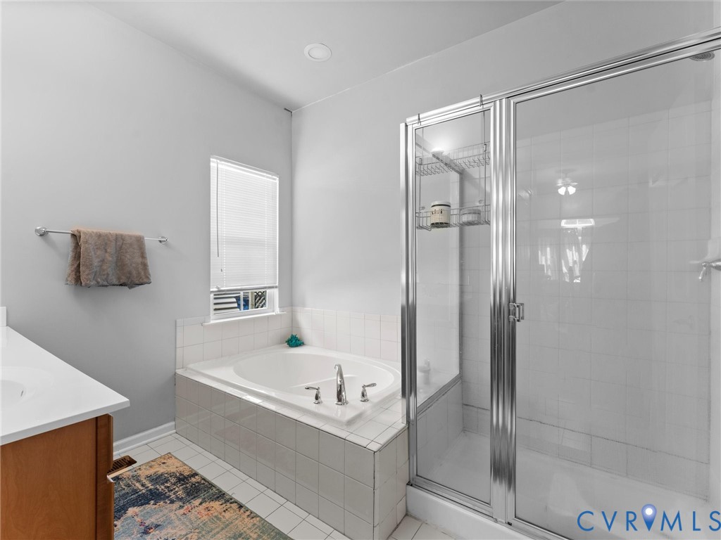 7434 South Franklins Way Quinton, VA 23141 - Photo 15 of 31 Bathroom featuring an integrated bathtub and a sep